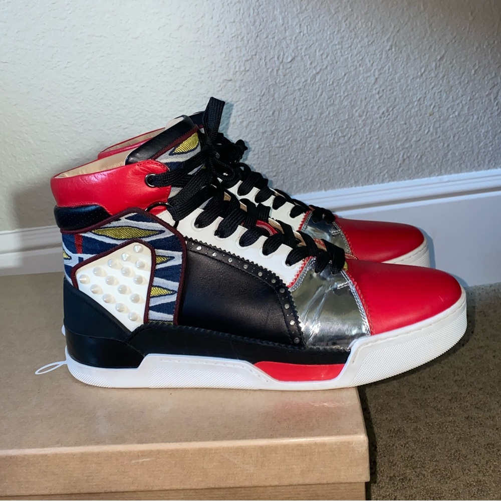 Studded Christian Louboutin high top sneakers